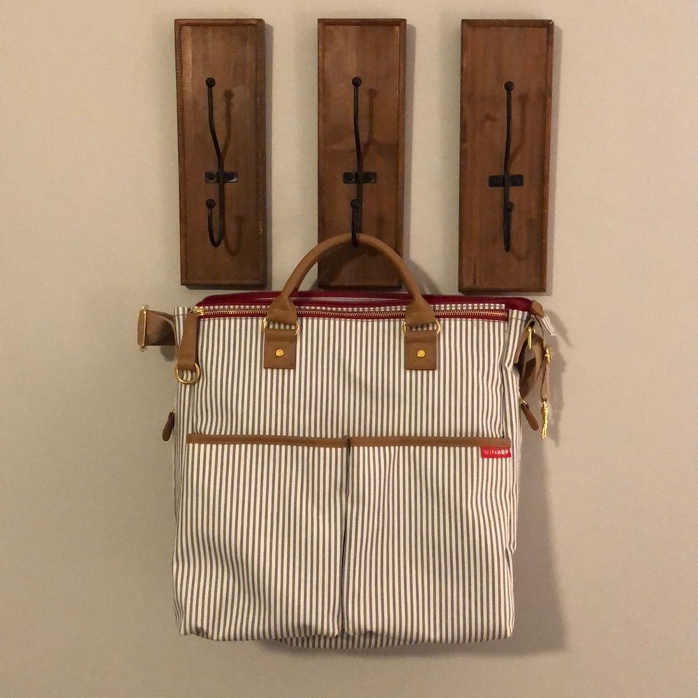 SkipHop cross body diaper bag